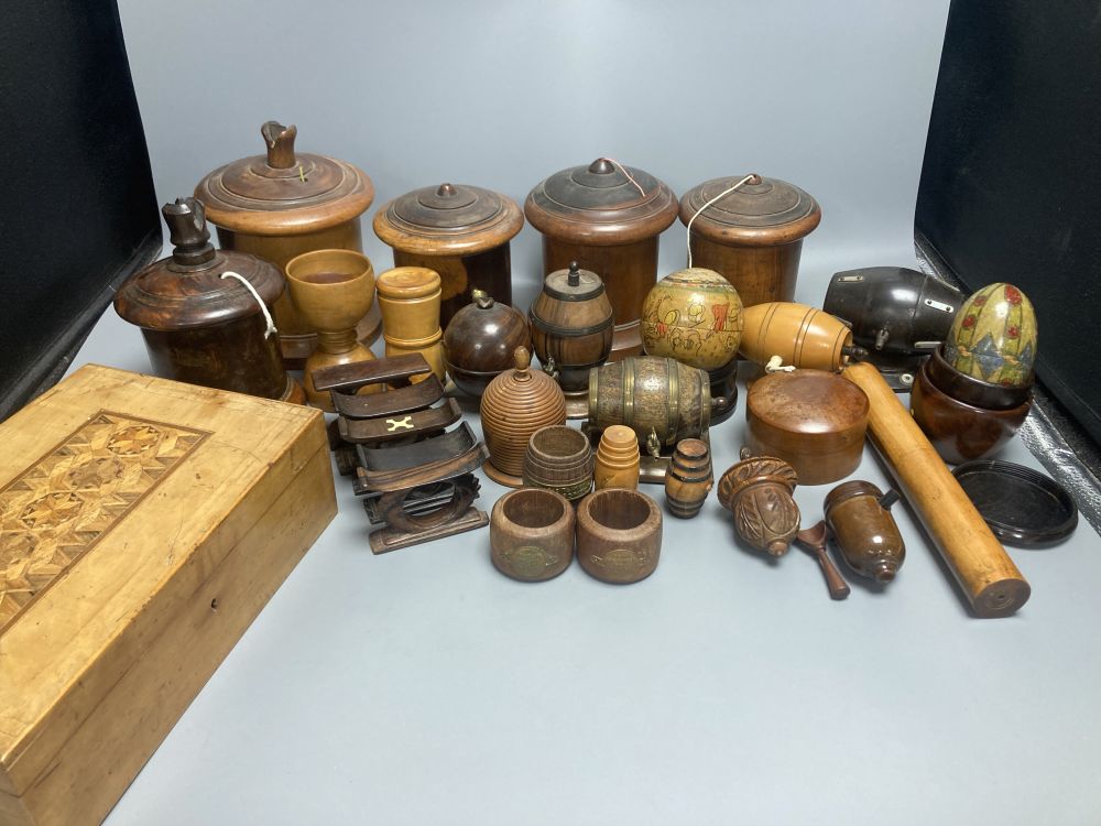 Five lignum vitae string dispensers, other treen ornaments, a parquetry box etc.